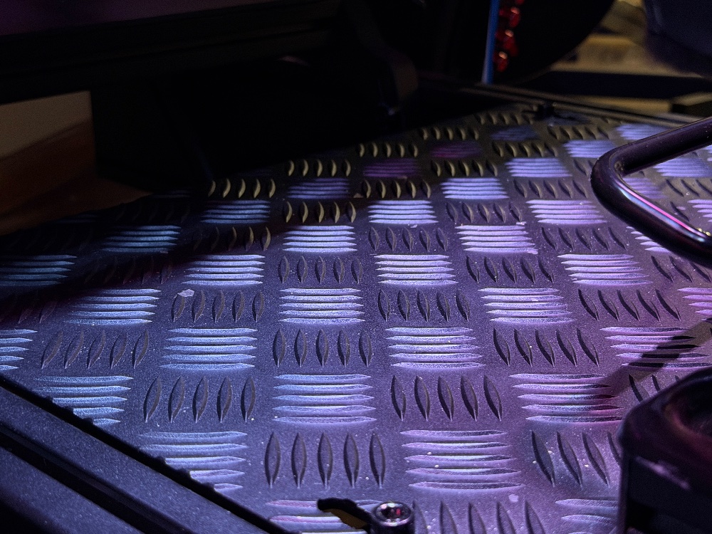 Aluminum diamond plated flooring — Theseus Motorsport sim rig detail